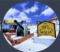 Welcome sign at Nathu La pass surrounded by snow