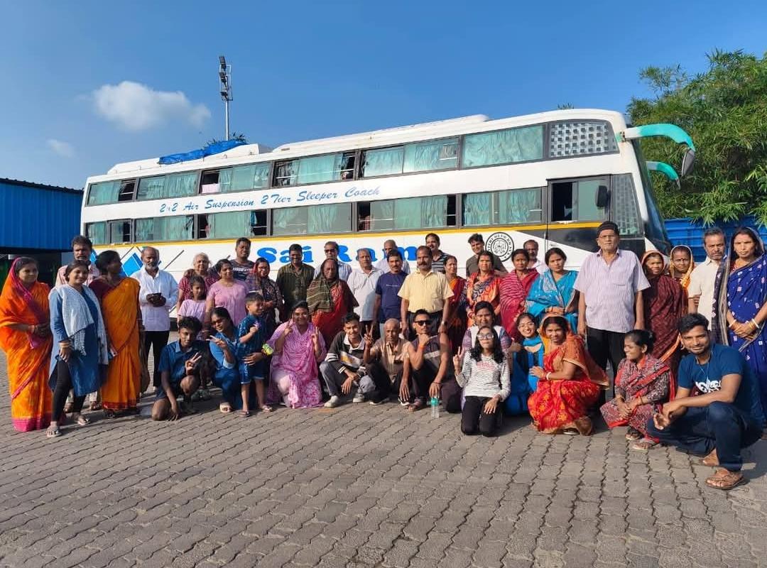 NP Service travellers gathered beside their coach