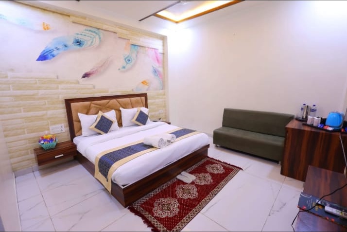 Guest room with neatly arranged beds and bedding
