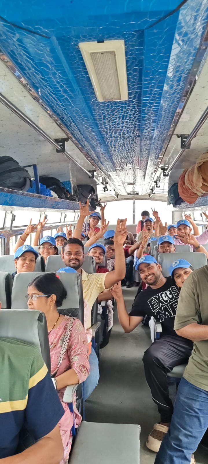 Passengers seated together inside the tour coach